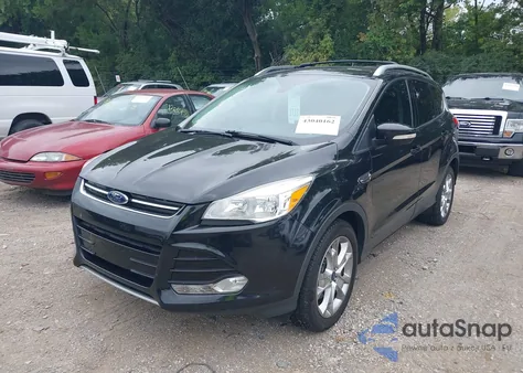 2015 Ford Escape Titanium z USA, uszkodzony, nr VIN 1FMCU9JX8FUB68371